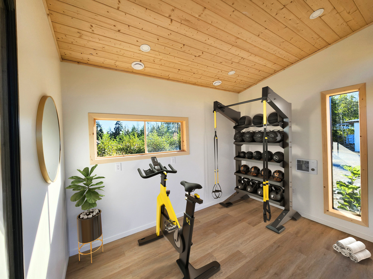 A backyard home gym with exercise bike and weights